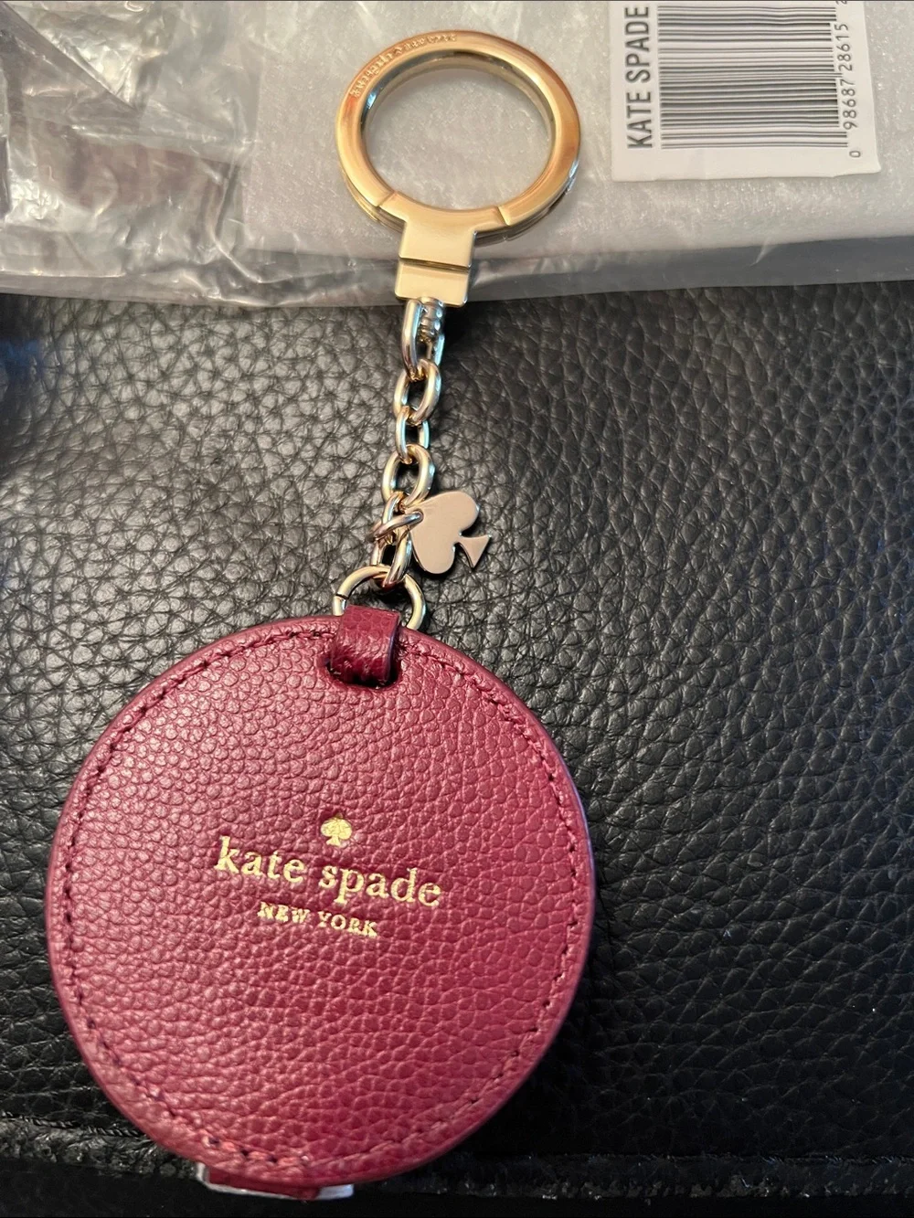 KATE SPADE NWT berry leather circle keyring bag charm with gold hardware